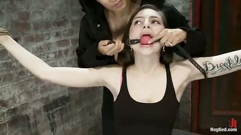 A nubile girl next door tied spread for her first bondage shoot